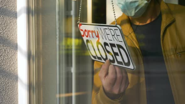 Open Sign in a Small Business Shop After Pandemic