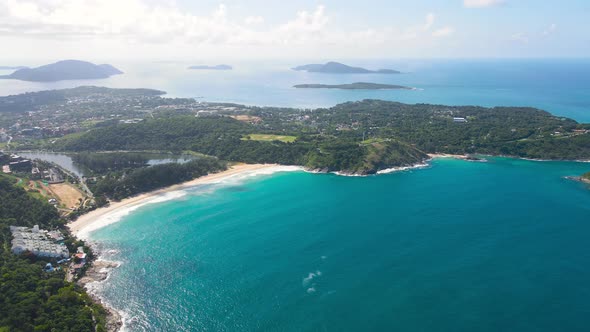 4K Aerial view drone shot Top-view of Coconut palm trees Top-down view. Green palm tree on beach and