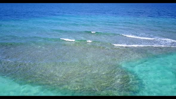 Aerial drone view texture of exotic shore beach lifestyle by blue ocean and white sandy background o