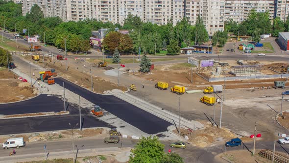 Asphalt Paver Roller and Truck on the Road Repair Site During Asphalting Timelapse