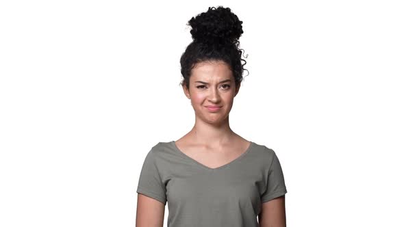 Portrait of Modest Young Woman 20s Shaking Head and Expressing Sorry Disagree or Don't Want Isolated