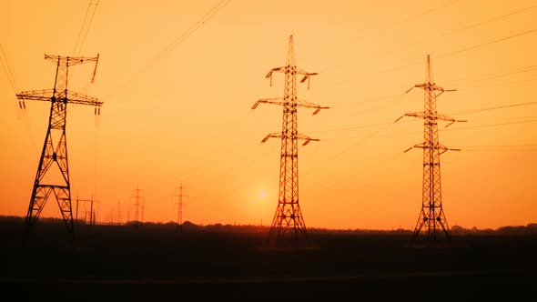 High Voltage Power Lines At The Sunset Time 