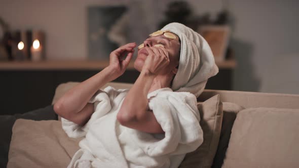 Woman Chilling With Banana Slices On Face