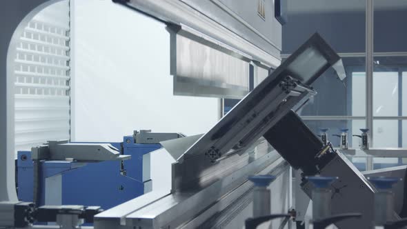 Metal bending robot in a metal production facility