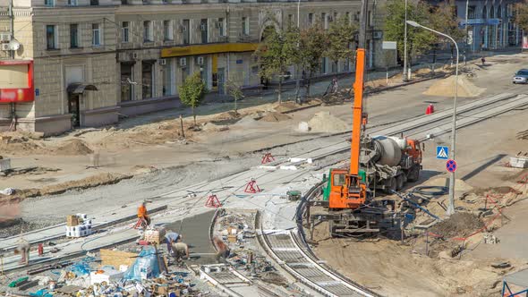 Concrete Works for Road Construction with Many Workers and Mixer Timelapse