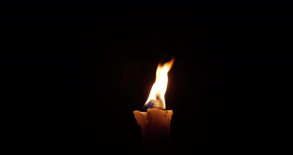 Burning Torch On A Black Background