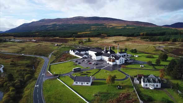 Aerial Pan Around of a Distillery and Farmland in Dalwhinnie Scotland