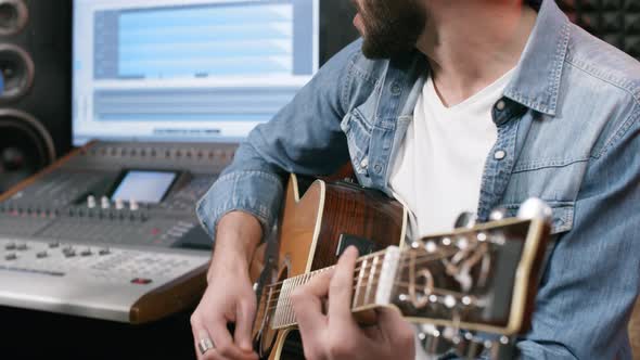 People Performing Song in Recording Studio