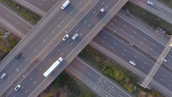 Vehicles Driving on a Freeway at Sunset Using The Junction and Bridges