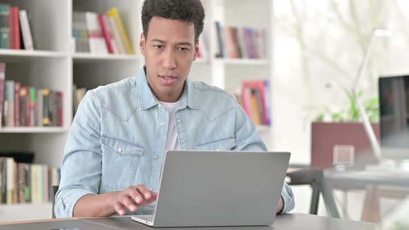 No, Young African American Man Rejecting By Finger Sign at Work 