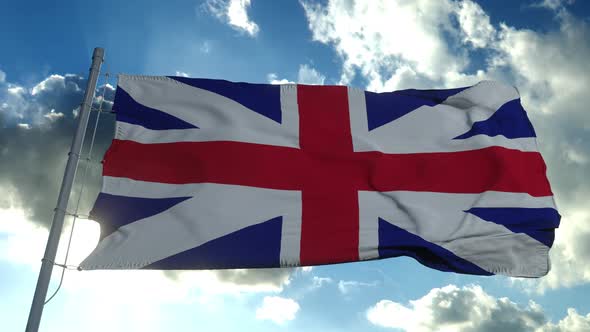 United Kingdom Flag Blowing Wind Slow Motion Against Clear Blue Sky