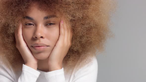 Mixed Race Black Woman with Face Rest on Hands Portrait