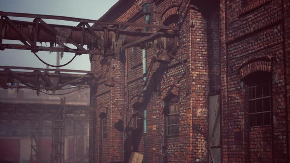 Abandoned Industrial Factory Buildings at Sunset