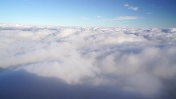 High Above the Thick Fog Like Beautiful Ocean of Clouds at Sunrise