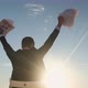 The businessman raises the sheets of paper up above his head. - VideoHive Item for Sale