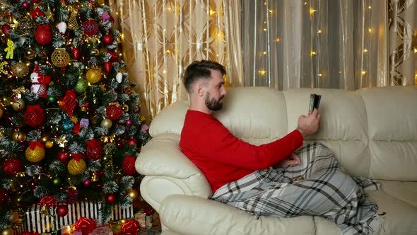 Young Caucasian Man Red Sweater Making Selfies