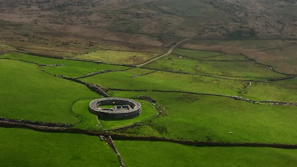 Loher Ringfort, Kerry, Ireland, March 2022. Drone orbits the ancient monument from the northwest at