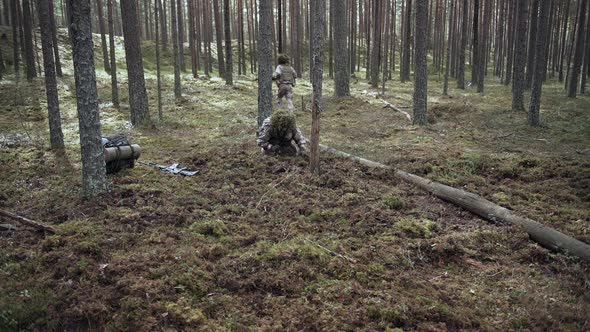 Soldiers Prepare a Trench in a Pine Forest