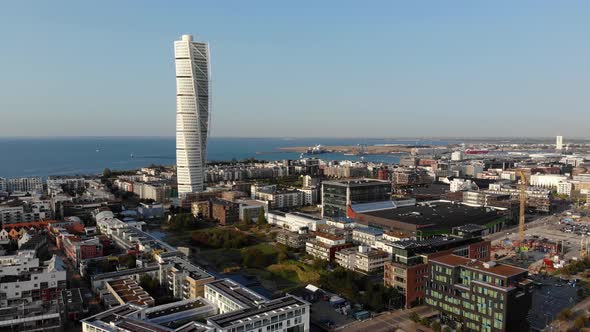 Drone spinning around turning torso, Malmö, Sweden, evening time late summer