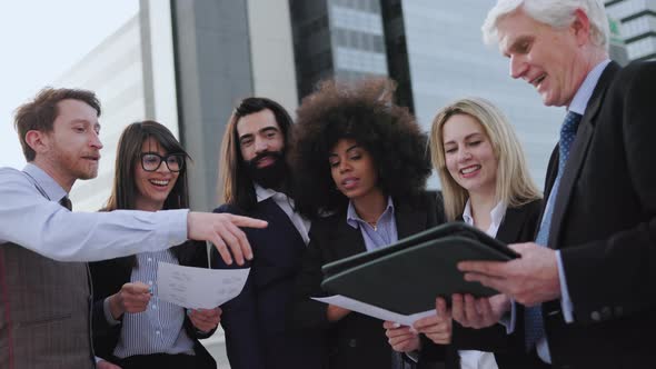 Multiracial business people working outdoor outside the office - Meeting entrepreneur team