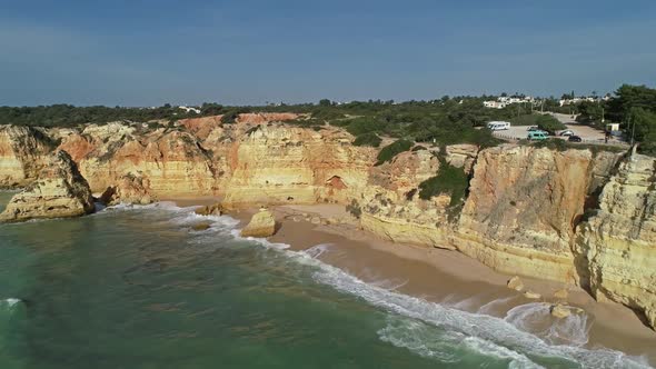 Aerial View on Cliffs and Waves in Algarve