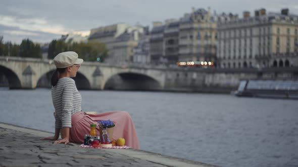 Young girl on a picnic in Paris