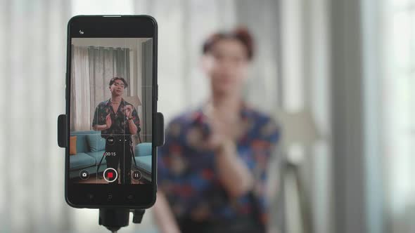 Display Smartphone Of Asian Transgender Male Dancing While Shooting Video Content For Social Network