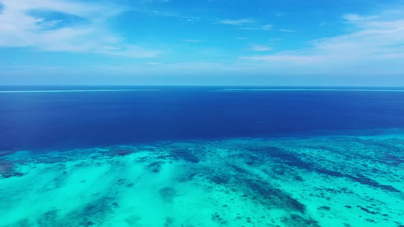 Aerial drone nature of exotic seashore beach lifestyle by blue water with white sandy background of 