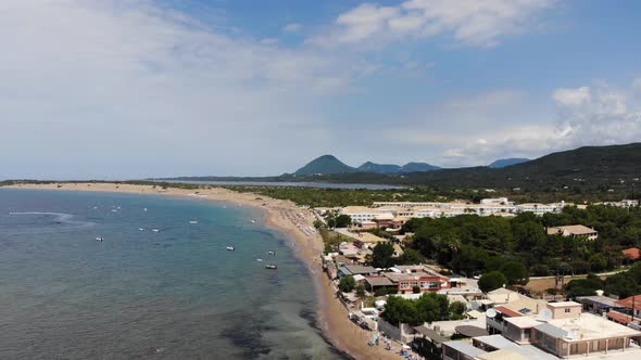 Aerial footage of the beautiful small town known as St George South, Greek city of Corfu Greece