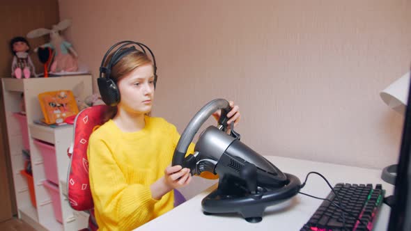 Girl In Headphones Playing On The Wheel