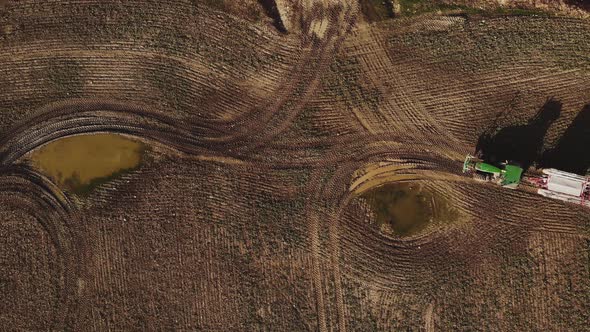 Aerial view of a tractor standing in the field