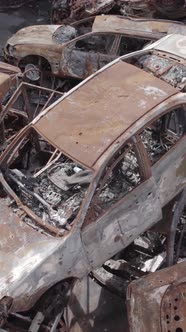 Vertical Video of a Dump of Destroyed Cars During the War in Ukraine