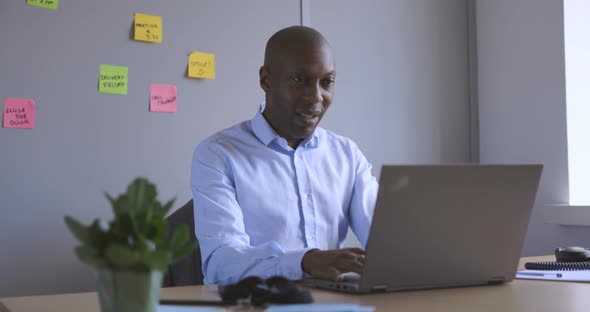 Tired businessman discovering mistake while working