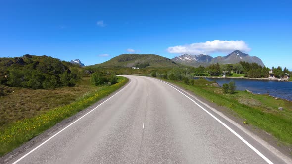 Driving a Car on a Road in Norway