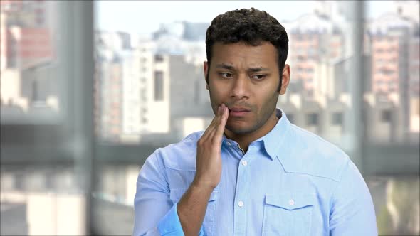 Indian Man with Toothache