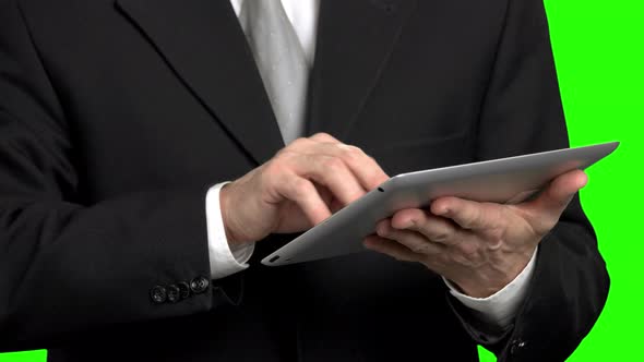 Man Fingers Tapping Tablet, Close Up.