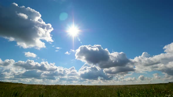 Clouds And Blue Sky Field