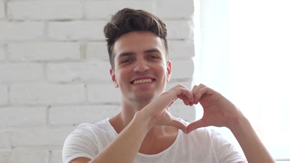 Heart Sign by Hands, Young Man
