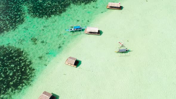 Manlawi Sandbar Floating Cottages in Caramoan Islands. A Lagoon with Floating Crotches, Top View.