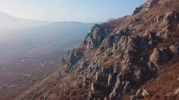 Scene of a Mountain Range Illuminated By the Sun From a Bird's Eye View