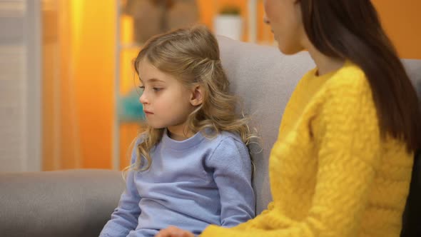 Sad Girl Turning Away From Lady, Not Accepting Babysitter, Conflict With Mother