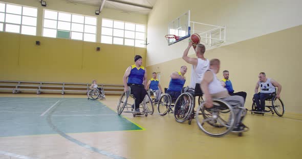 Persons with Disabilities Playing Basketball in the Modern Hall