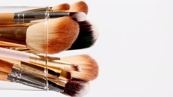 Makeup Brushes Rotation on White Background