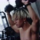 Young Asian Bodybuilder in training in the gym. Young man doing biceps exercise with dumbbells. - VideoHive Item for Sale