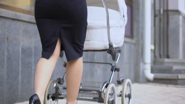 Lady in Suit Strolling With Baby, Demographic Situation, Birth Rate Statistics