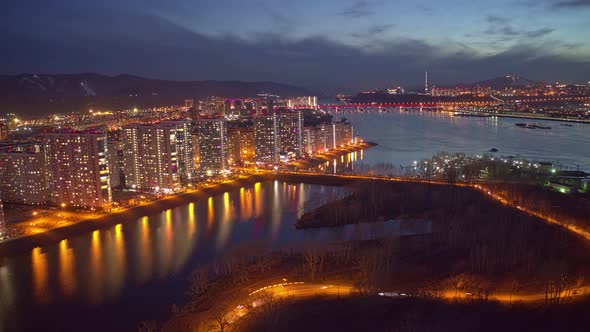 Aerial Night Timelapse of Residential Area on the Coast