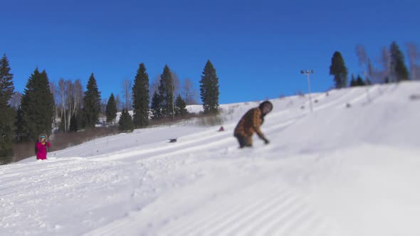 Snowboarder Demonstrate Jump Flight
