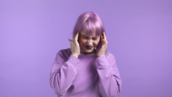 Portrait of Woman Having Headache Light Studio Portrait