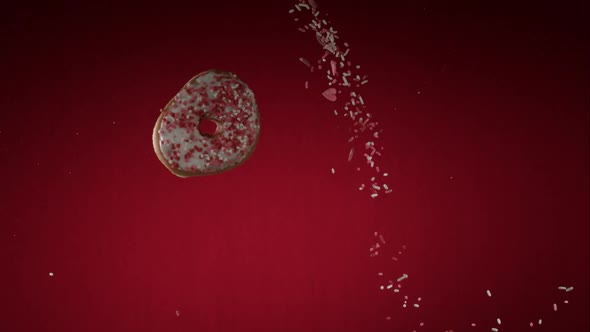 Doughnuts falling and bouncing in ultra slow mo 