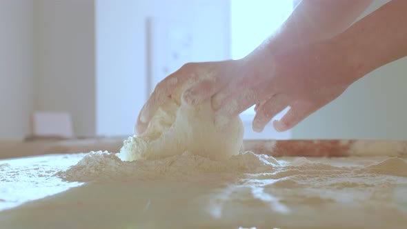 Close Up Making Dough By Female Hands at Bakery